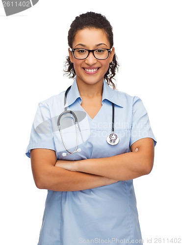 Image of smiling female african american doctor or nurse