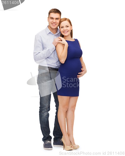 Image of happy young family expecting child