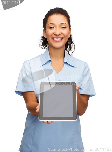 Image of smiling female doctor or nurse with tablet pc