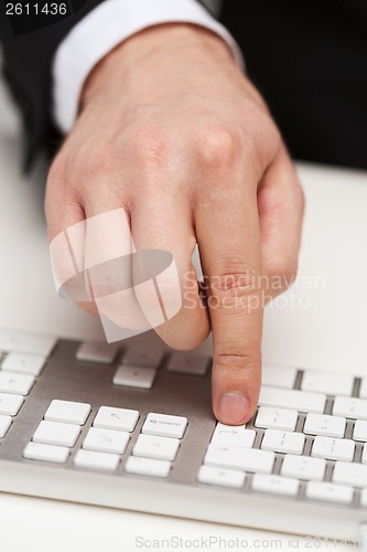 Image of businessman working with keyboard