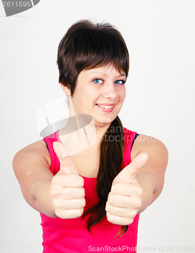 Image of Young girl with thumb up