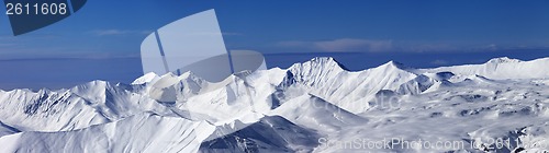 Image of Panoramic view on off-piste slope and snowy plateau at nice day