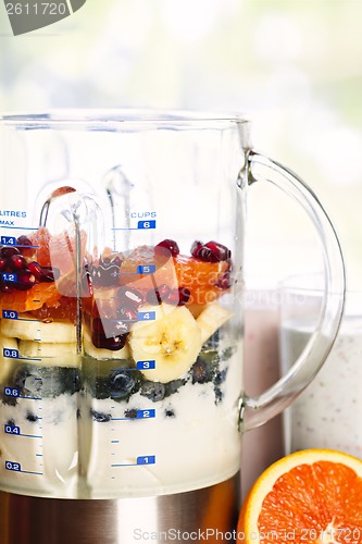 Image of Blender with fruit and yogurt