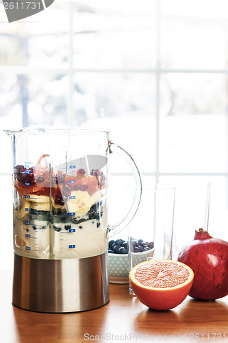 Image of Preparing smoothies with fruit and yogurt