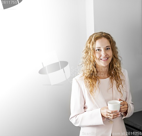 Image of Businesswoman with coffee