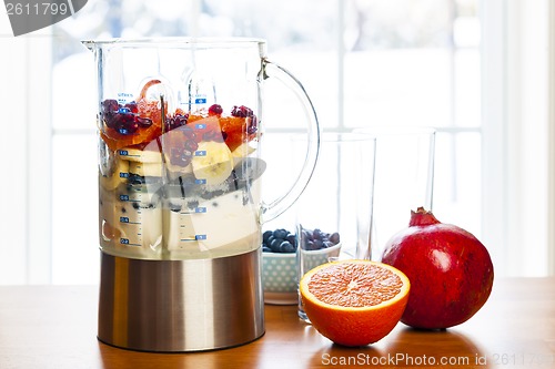 Image of Preparing smoothies with fruit and yogurt