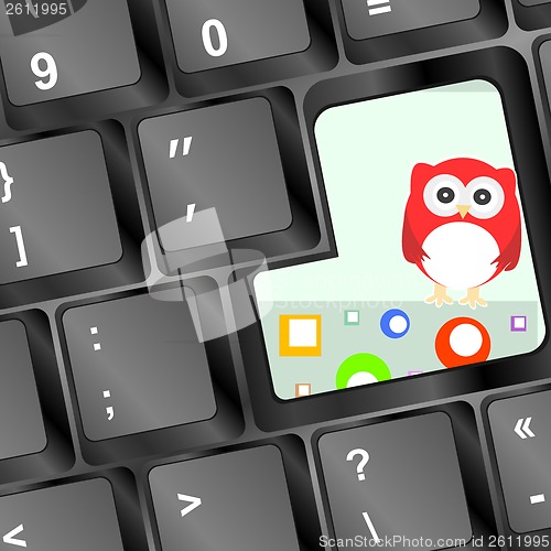 Image of owl on computer keyboard key with abstract circles