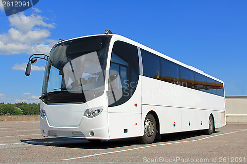 Image of White Bus in Summer