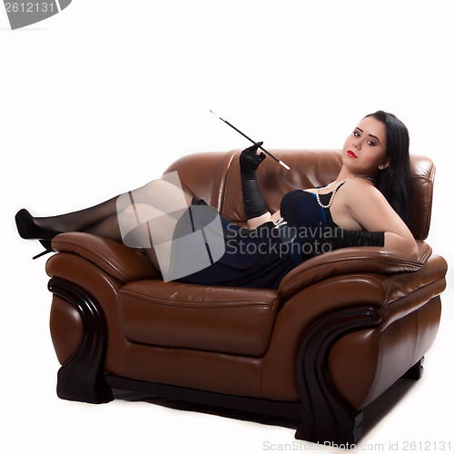 Image of Retro woman on chair