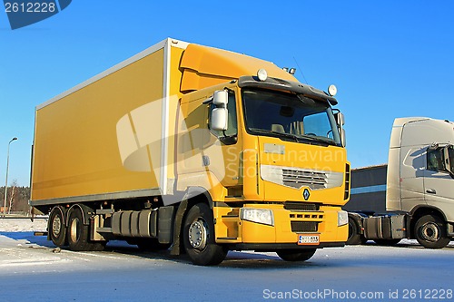 Image of Yellow Renault Premium 410 Delivery Truck