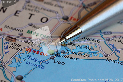 Image of Ballpoint Pen Pointing at Venice on a Map of Italy
