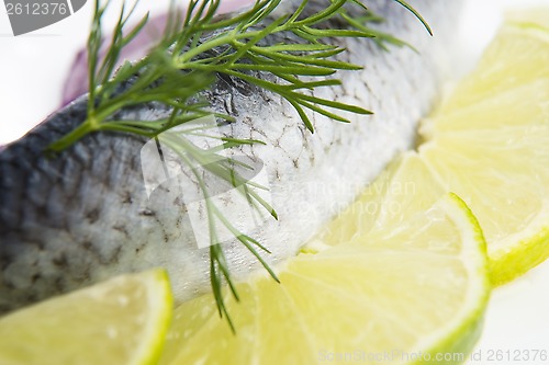 Image of Fillet herring with onion and lemon