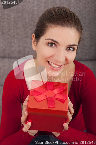 Image of Woman with a christmas present