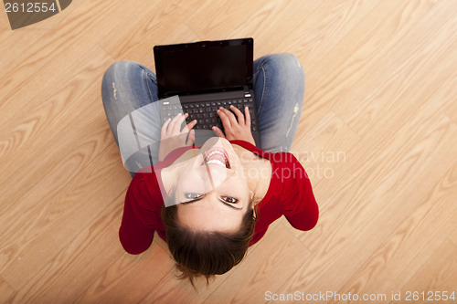 Image of Woman working with a laptop