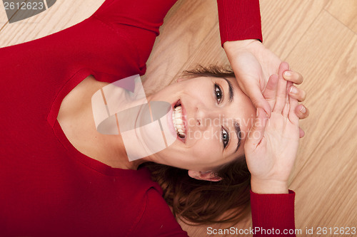 Image of Woman lying on the floor