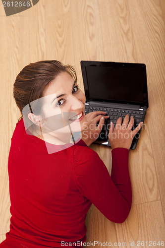 Image of Woman working with a laptop