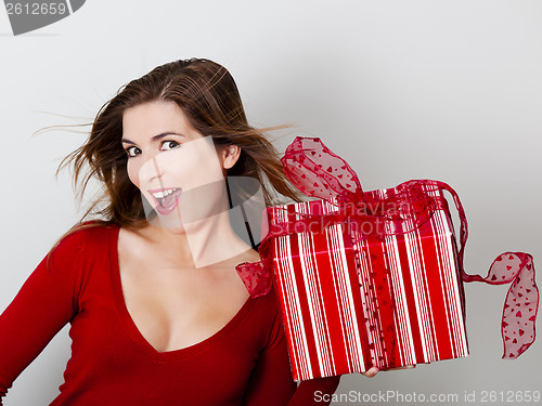 Image of Woman with a big present