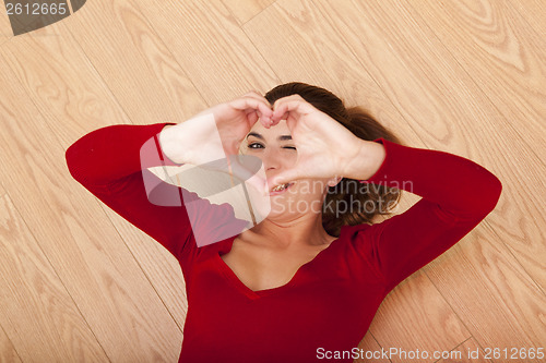 Image of Woman lying on the floor