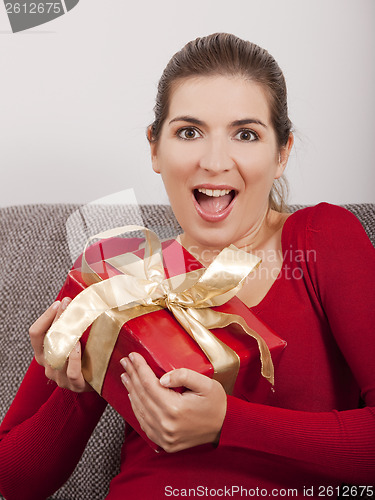 Image of Opening a christmas present