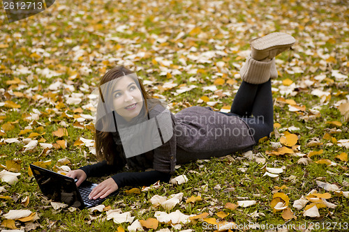 Image of Woman working with a laptop