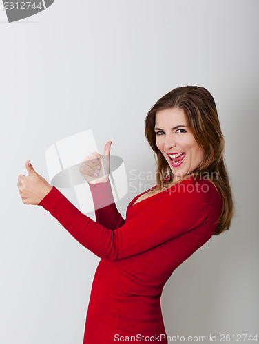 Image of Happy woman with thumbs up