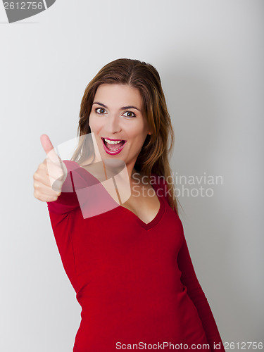 Image of Happy woman with thumbs up
