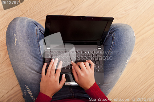 Image of Woman working with a laptop