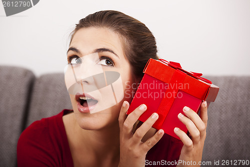 Image of Trying to guess what is inside the present