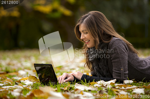 Image of Woman working with a laptop