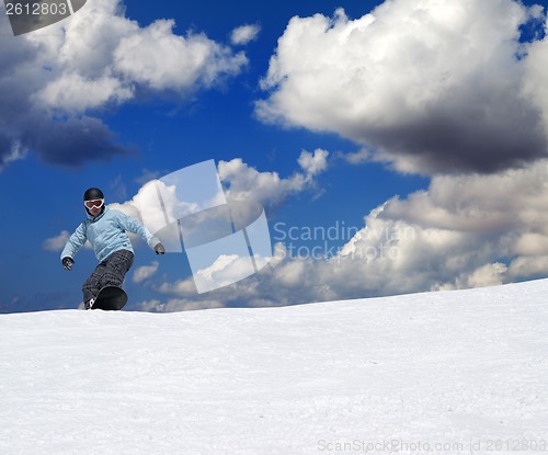 Image of Snowboarder on off-piste slope