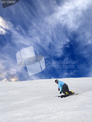 Image of Snowboarder on ski slope