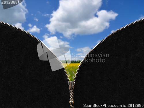 Image of Zipper and rural spring landscape