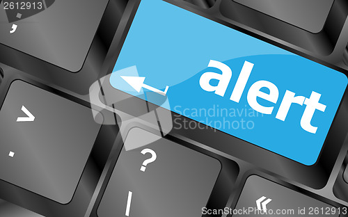 Image of Computer keyboard with attention key alert - business background