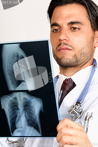 Image of Doctor examining x-rays