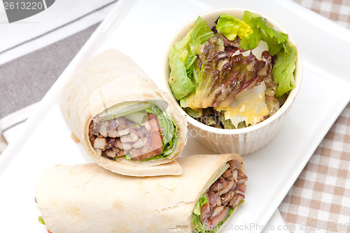 Image of kafta shawarma chicken pita wrap roll sandwich