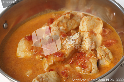 Image of Fish curry in a kadai closeup