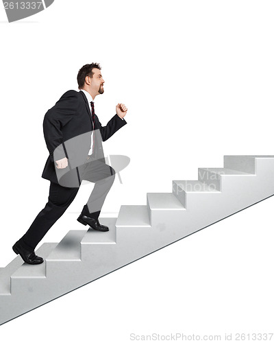 Image of business man and stairs