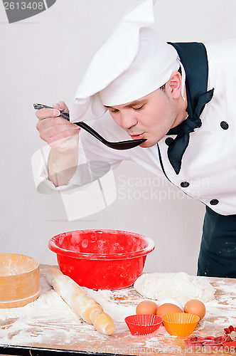 Image of chef with large spoon