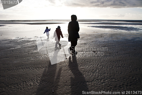 Image of People looking for amber at the beach of the Island of Fanoe in 