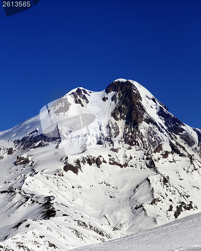 Image of Mount Kazbek at sun winter day