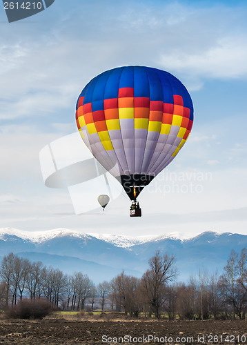 Image of Multicolored Balloon in the blue sky