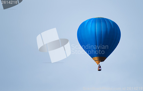 Image of Blue balloon in the blue sky