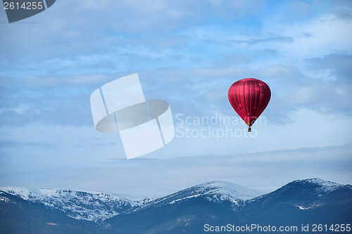 Image of Red balloon in the blue sky