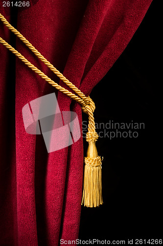 Image of Red velvet curtain with tassel