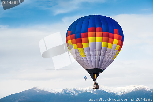 Image of Multicolored Balloon in the blue sky