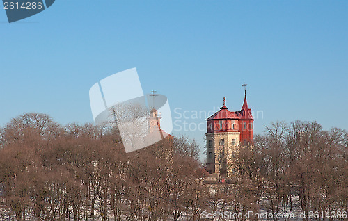 Image of Ancient tower on the blue sky background.