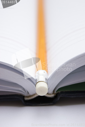 Image of Pencil on a book