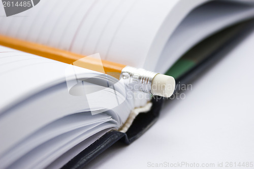 Image of Pencil on a book