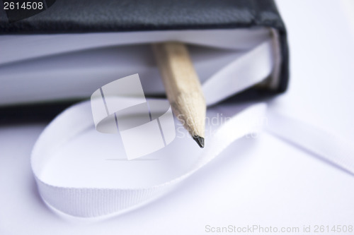 Image of Pencil on a book