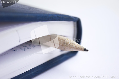 Image of Pencil on a book